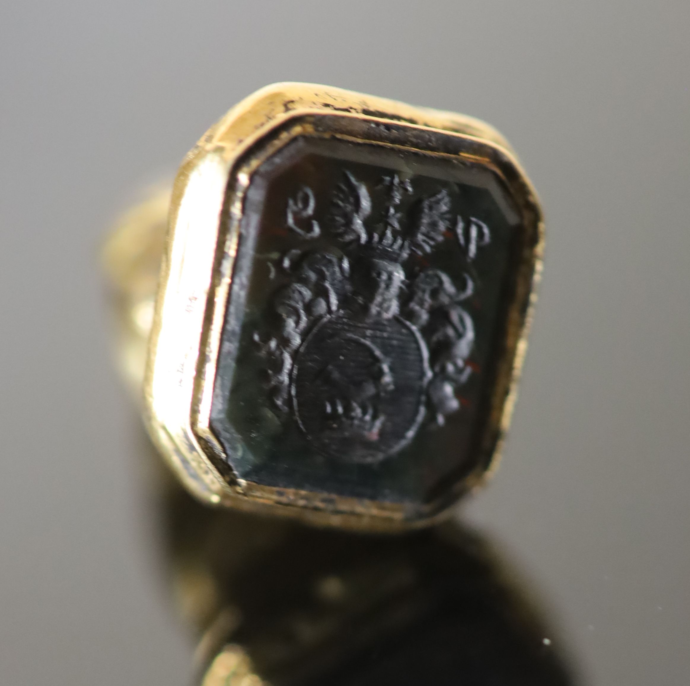 A 19th century gold and black onyx? set seal,